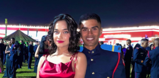 An officer cadet with his ball partner.