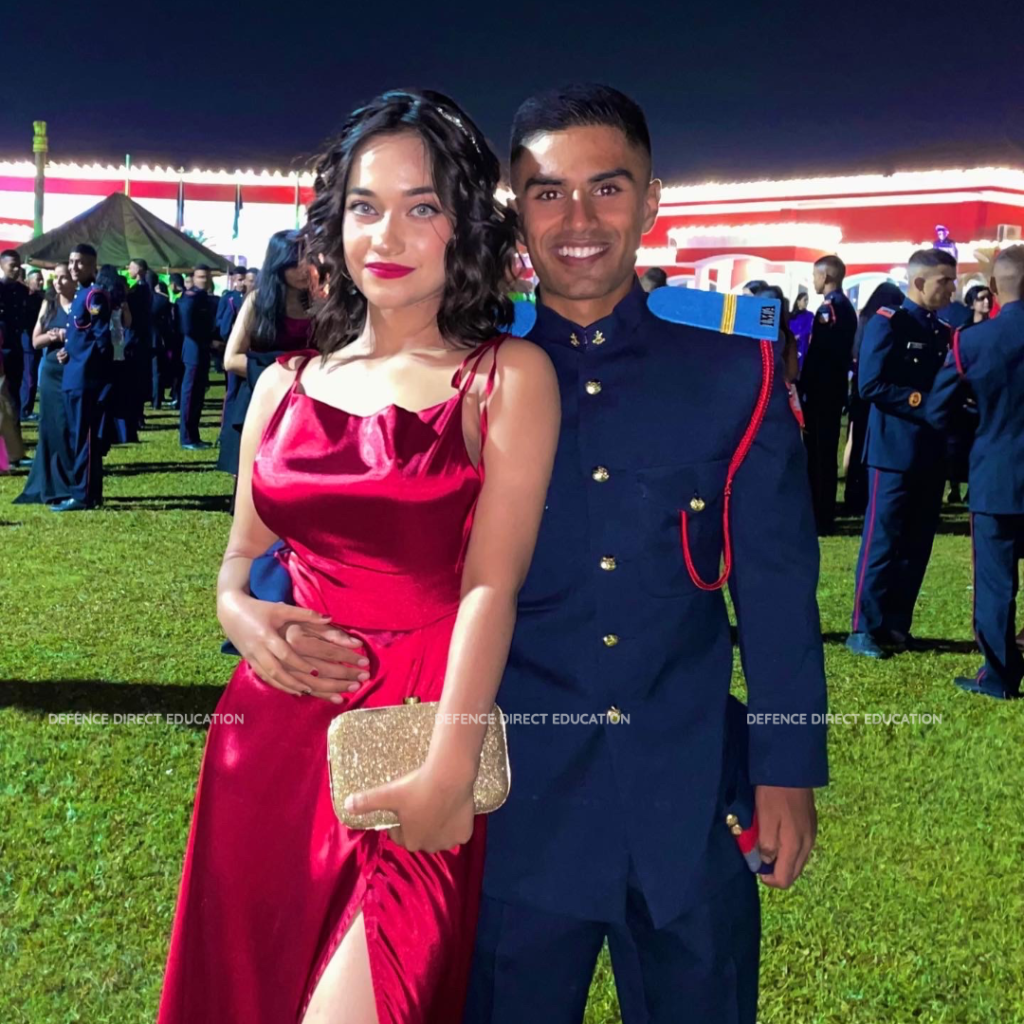 An officer cadet with his ball partner.