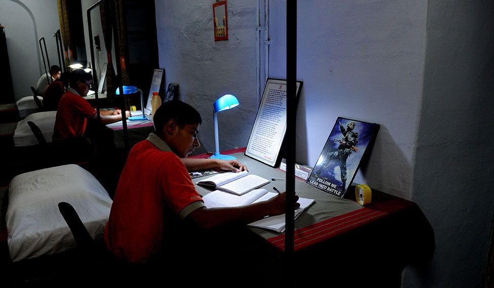 OTA cadets studying at night.