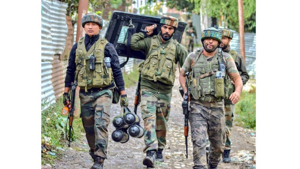 RR personnel carrying weapons